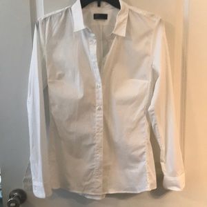 Professional fitted white button down shirt.